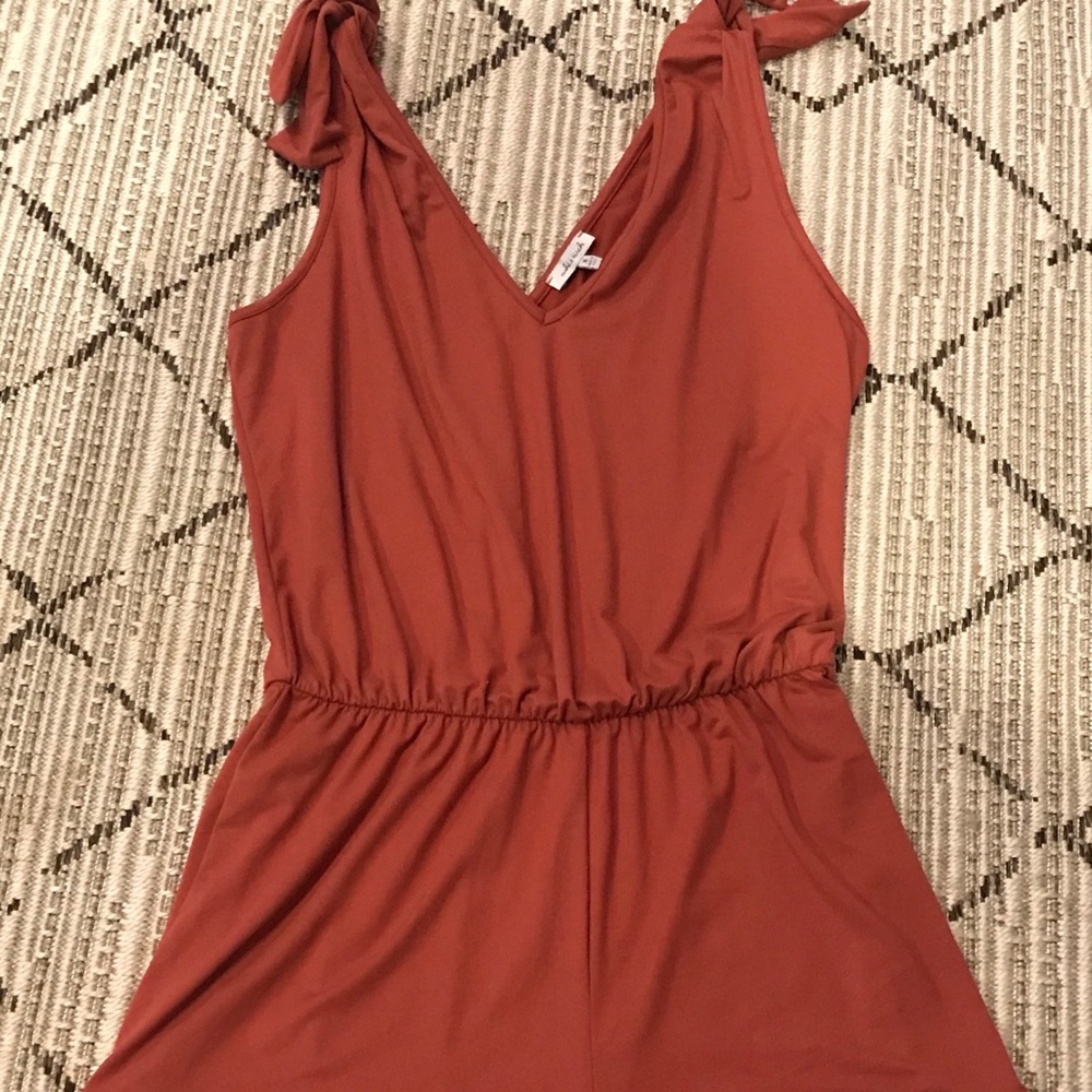 Size m rust colored boutique Romper